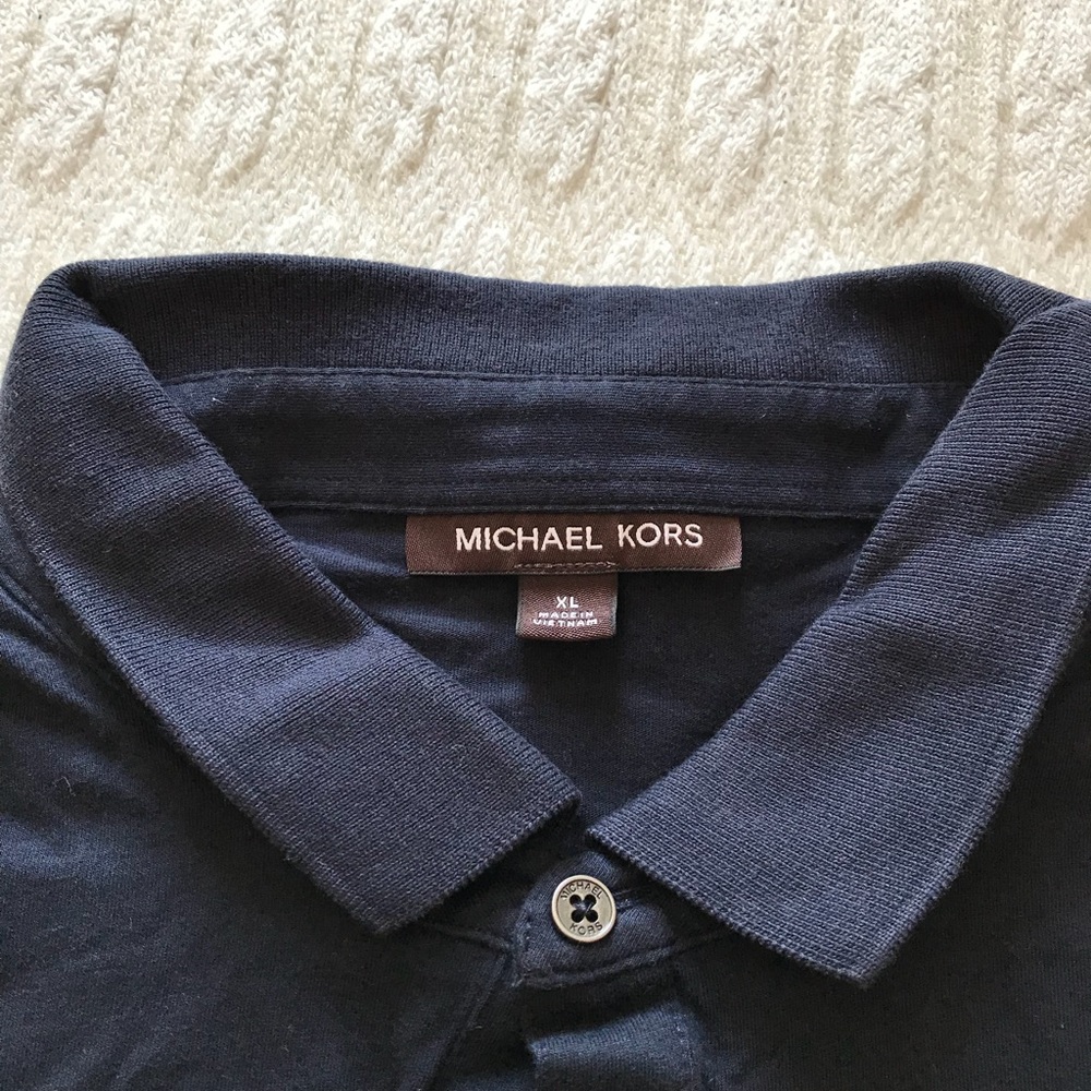 Selling a dark blue michael kors polo tee size xl